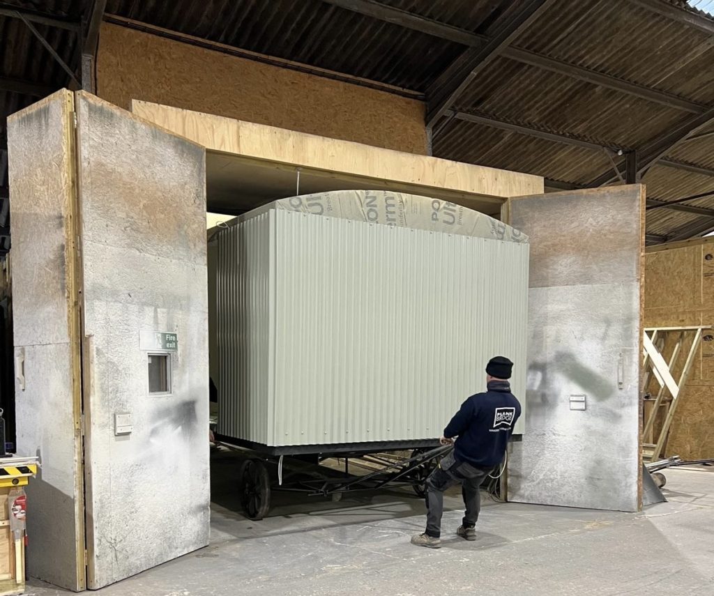 Painting a shepherd's hut